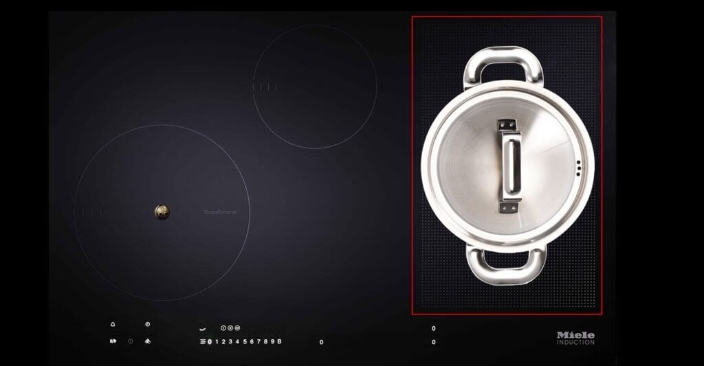 Miele induction cooktop with a pot on top.