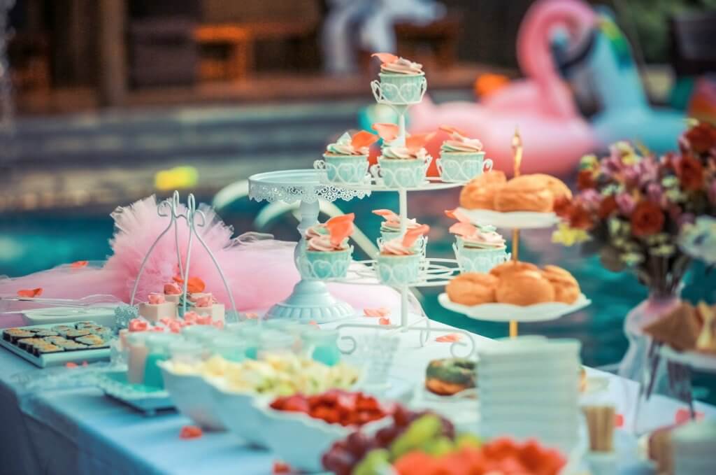 cupcakes, pastries and fruits served by the pool for summer